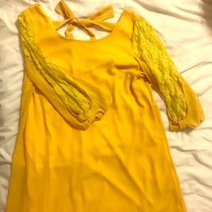 Mustard colored lace sleeved dress